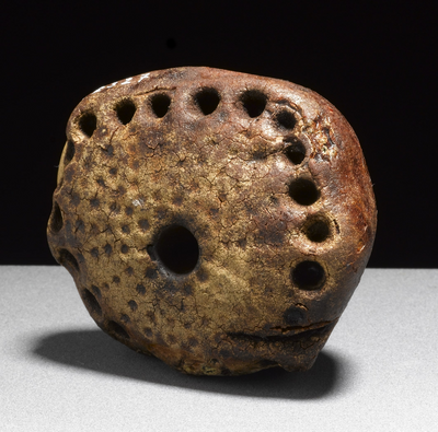 Amber pendant from Boel in Vendsyssel. 3700-3300 BCE. How were the amber beads used?