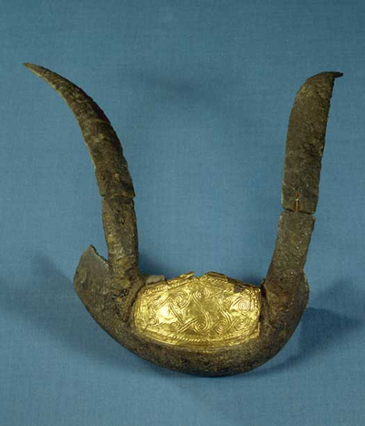 This mask from The Early Bronze Age, furnished with bronze horns and golden application, was found at Hagendrup in western Zealand. What were the helmets used for?